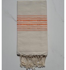 Fouta thalasso beige avec des motifs orange 