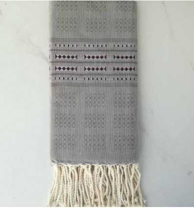 Fouta thalasso vert avec motifs aubergine