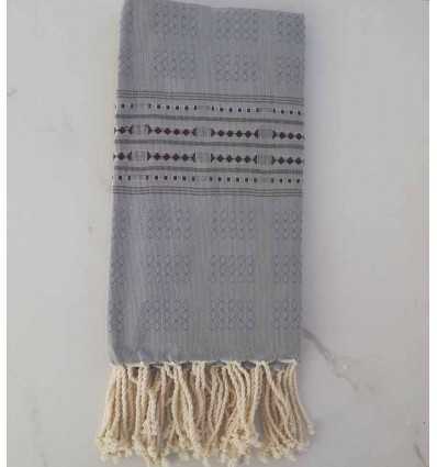 Fouta thalasso bleu avec motifs aubergine