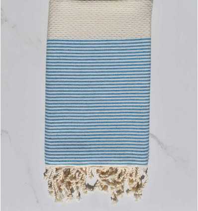 Fouta nid d'abeille crème rayée bleu